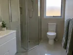 Example work photo: a freshly cleaned bathroom and shower screen